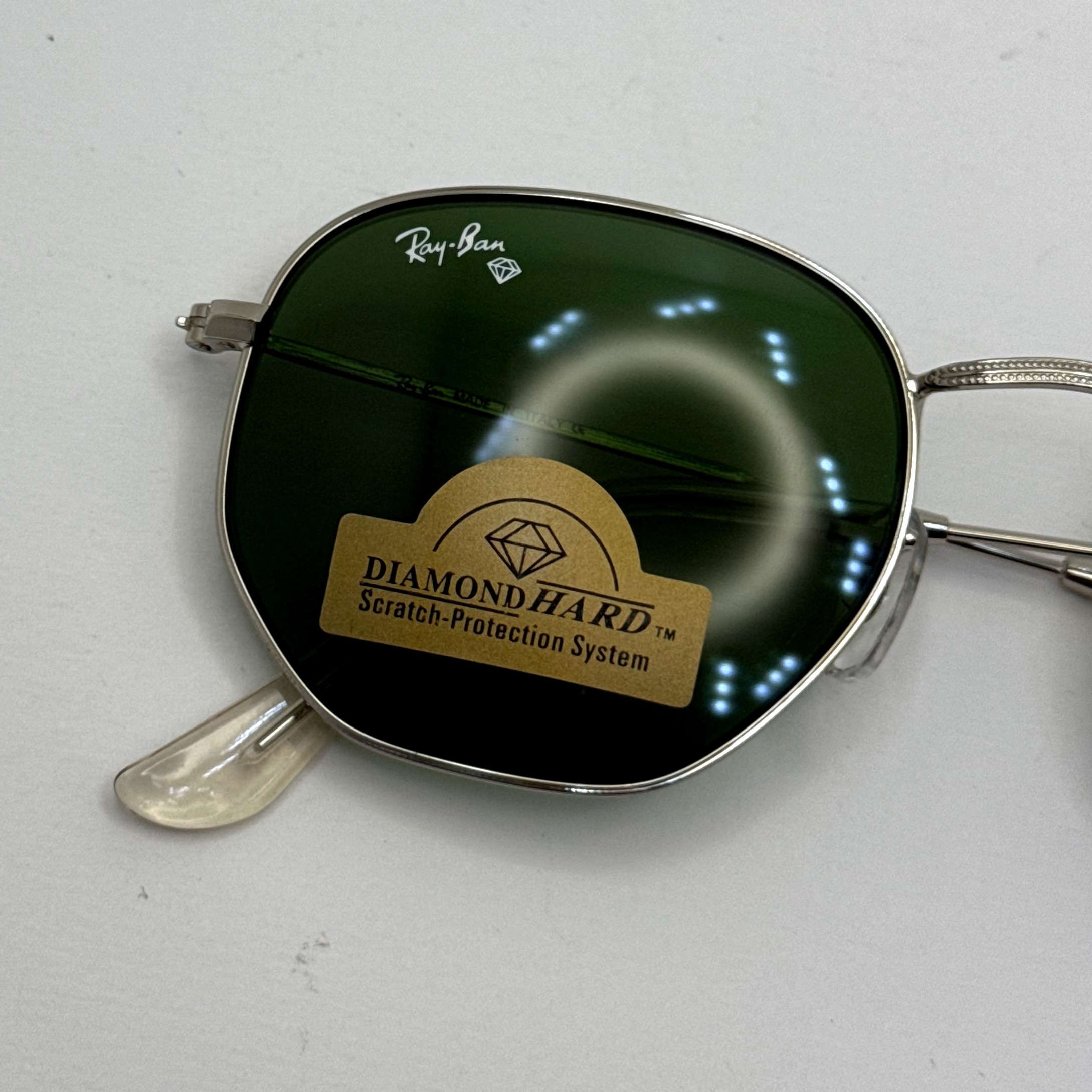عینک ریبن هگزونال شیشه سنگ سبز فریم نقره ای به همراه پک کامل ریبن کد Rayban RB 3548