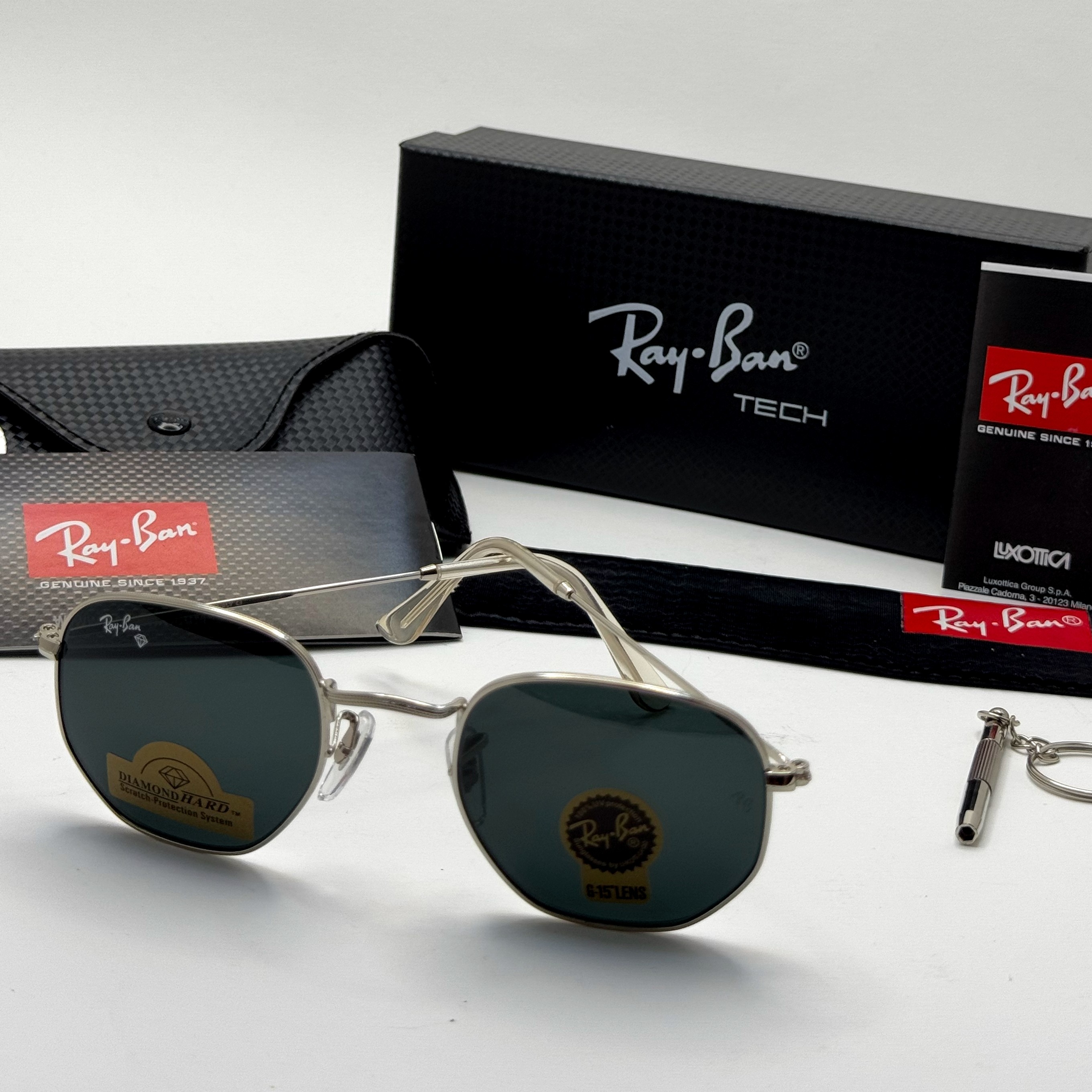 عینک ریبن هگزونال شیشه سنگ مشکی فریم نقره ای به همراه پک کامل ریبن کد Rayban RB 3548