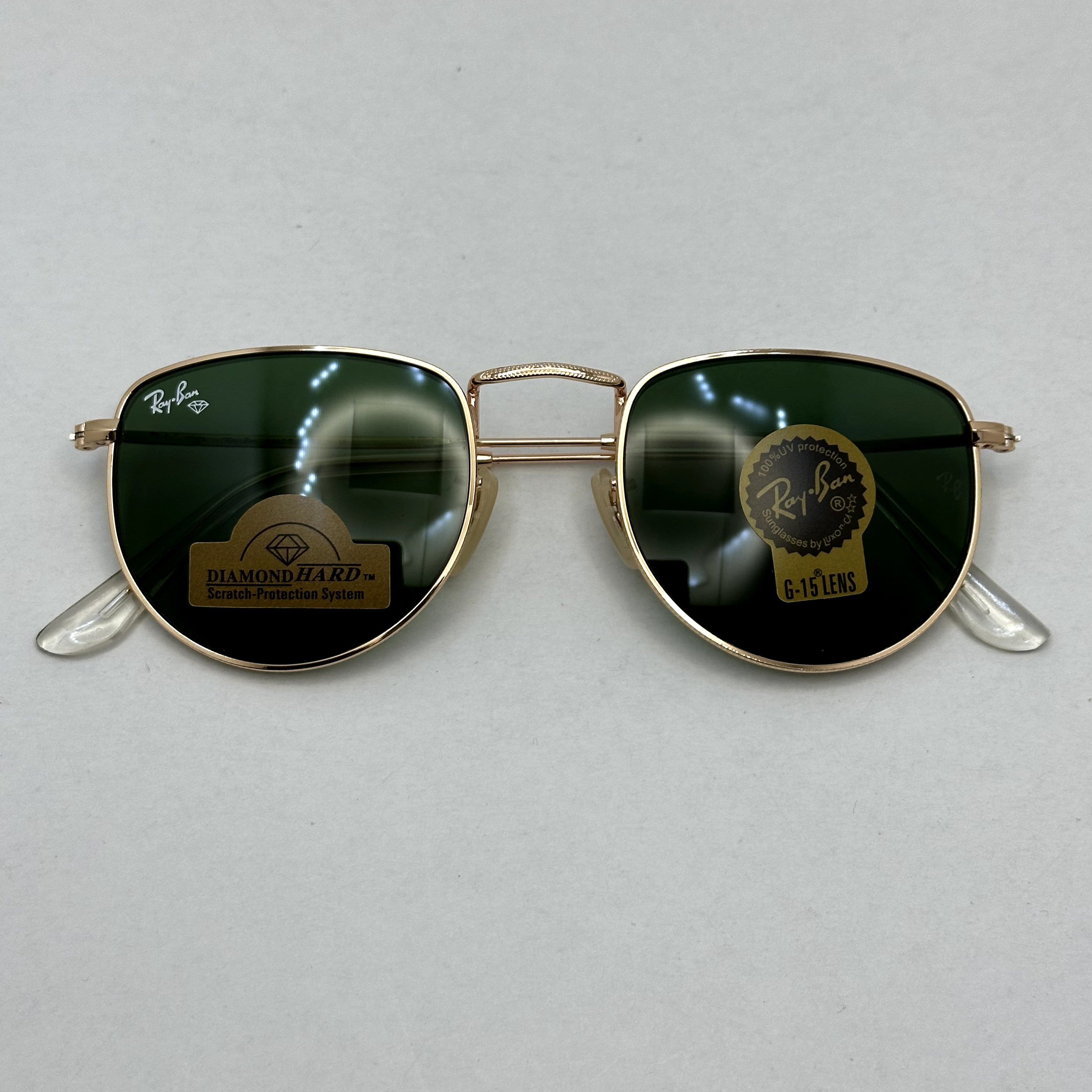 عینک آفتابی ریبن rayban شیشه سنگ سبز طلایی کد rb 3958 - فول پک