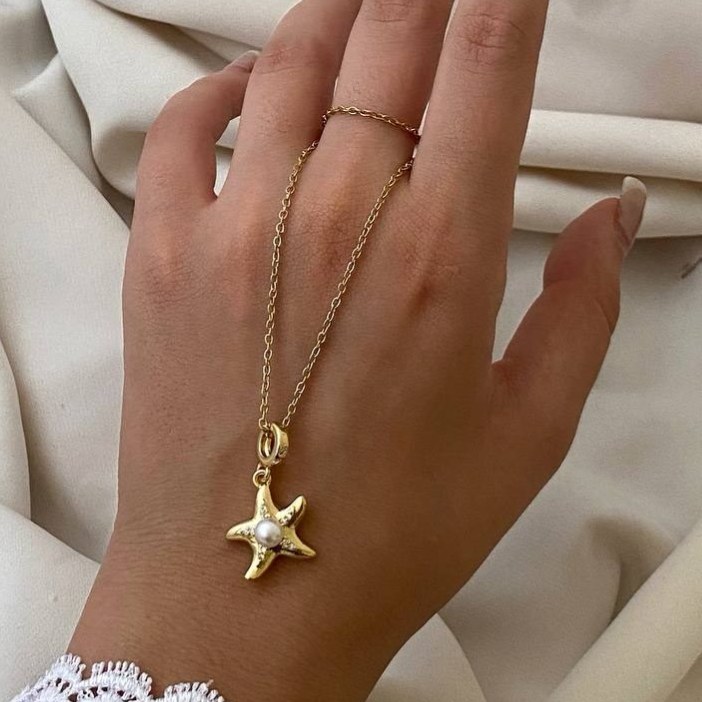 گردنبند زنانه طرح ستاره ، قلب ، گل ، مروارید و دم وال فری سایز Freesize رنگ کاملا ثابت کد tj (پس کرایه)