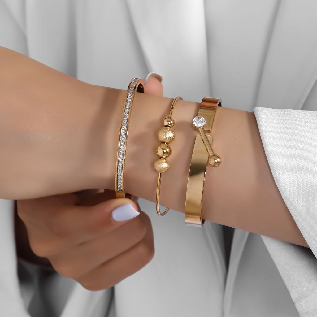 دستبند النگویی و بنگل استیل زنانه طرح گوی و نگین تنوع طرح رنگ ثابت کد tj (پس کرایه)