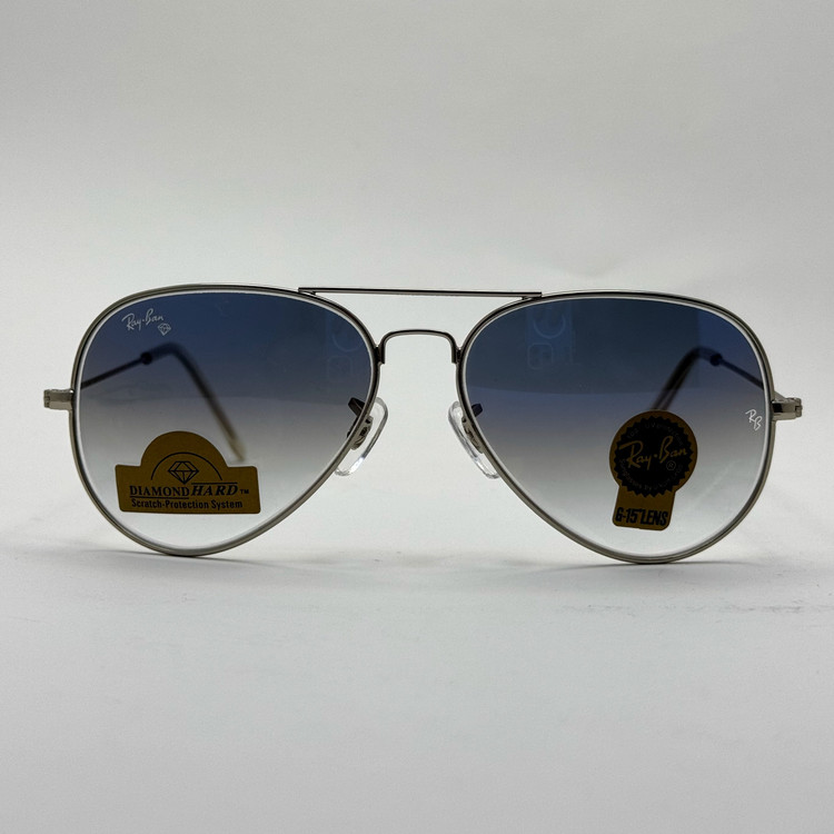 عینک ریبن خلبانی شیشه سنگ آبی هایلایت فریم نقره ای به همراه پک کامل ریبن Rayban RB 3025 (ارسال رایگان)